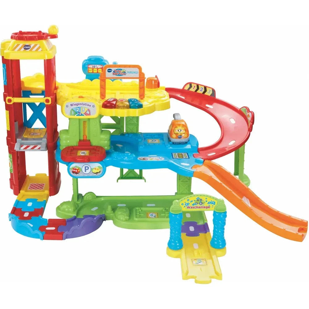 VTech Baby Flitzer - Parkgarage – Interaktives Spielzeug mit Abschleppwagen, Auf