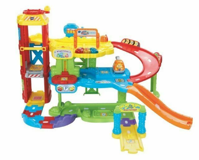 VTech Baby Flitzer - Parkgarage – Interaktives Spielzeug mit Abschleppwagen, Auf